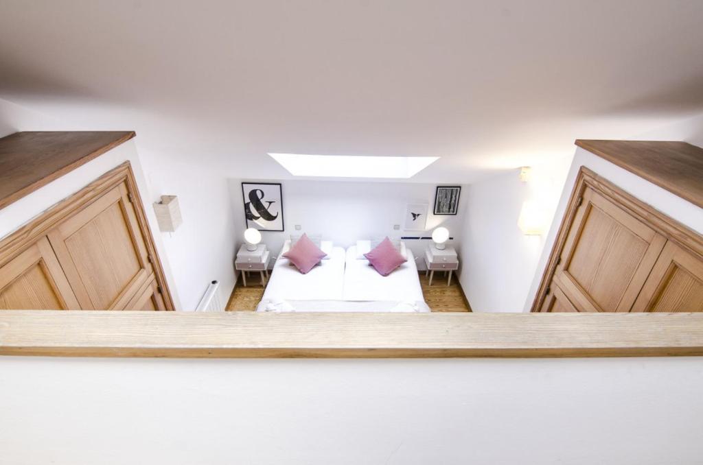 A bed or beds in a room at Apartment Fresa, 3