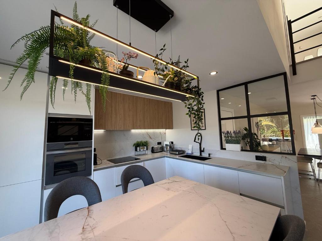 Kuchyň nebo kuchyňský kout v ubytování TarracoHomes, Town House La Mora
