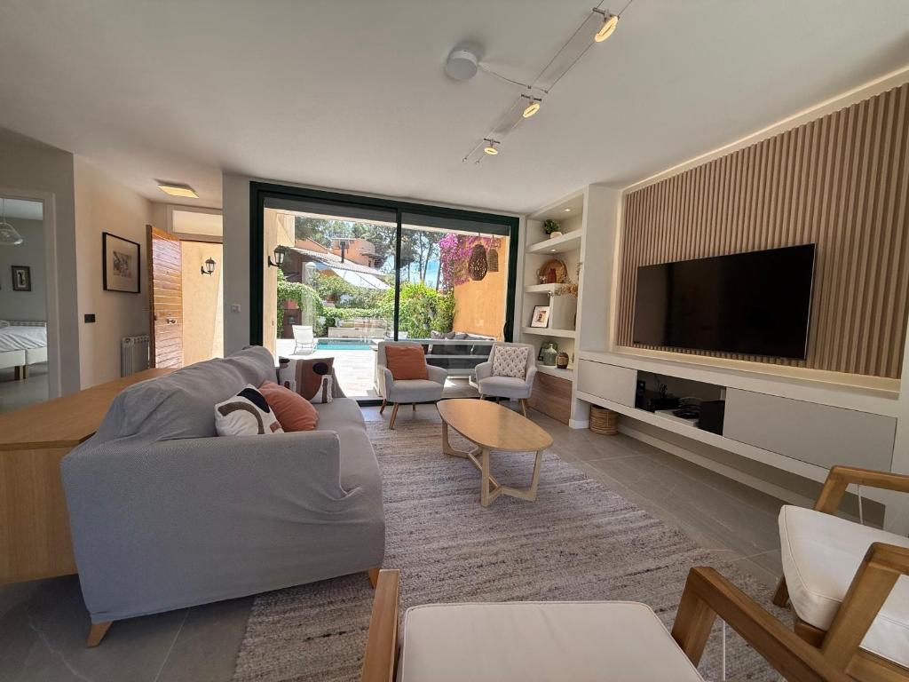 TV a/nebo společenská místnost v ubytování TarracoHomes, Town House La Mora