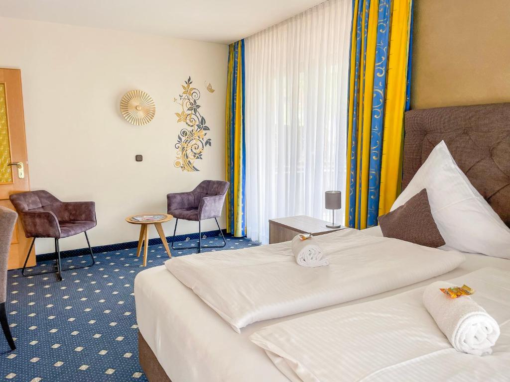 Postel nebo postele na pokoji v ubytování Gästehaus Forellenhof