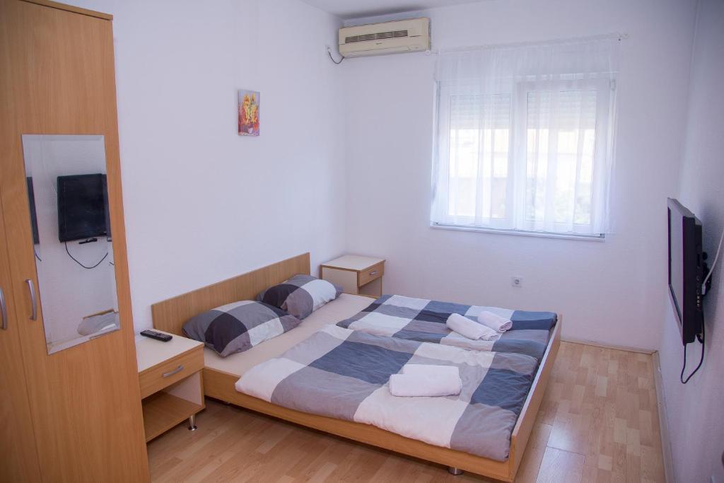 Postel nebo postele na pokoji v ubytování Guesthouse Bajric