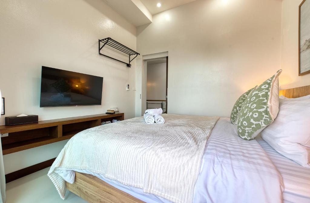 Postel nebo postele na pokoji v ubytování Surisa Seaview Pool Villas