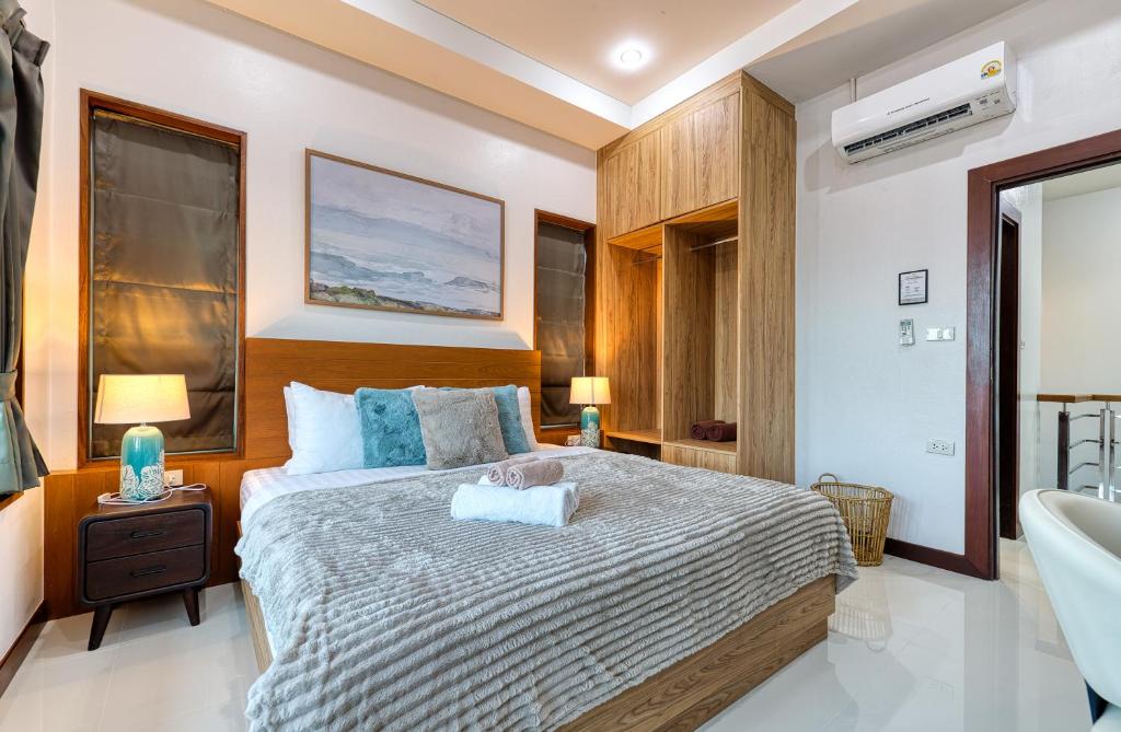 Postel nebo postele na pokoji v ubytování Surisa Seaview Pool Villas