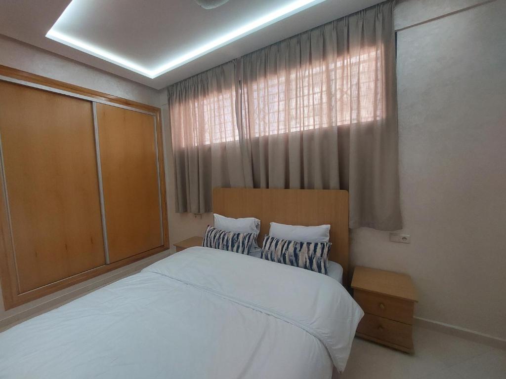 Postel nebo postele na pokoji v ubytování Safari Stay Appart front mer avec piscine