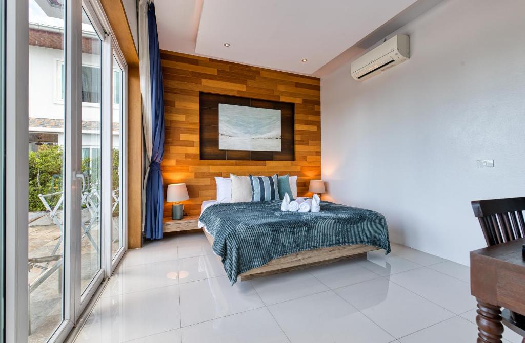 Postel nebo postele na pokoji v ubytování Surisa Seaview Pool Villas