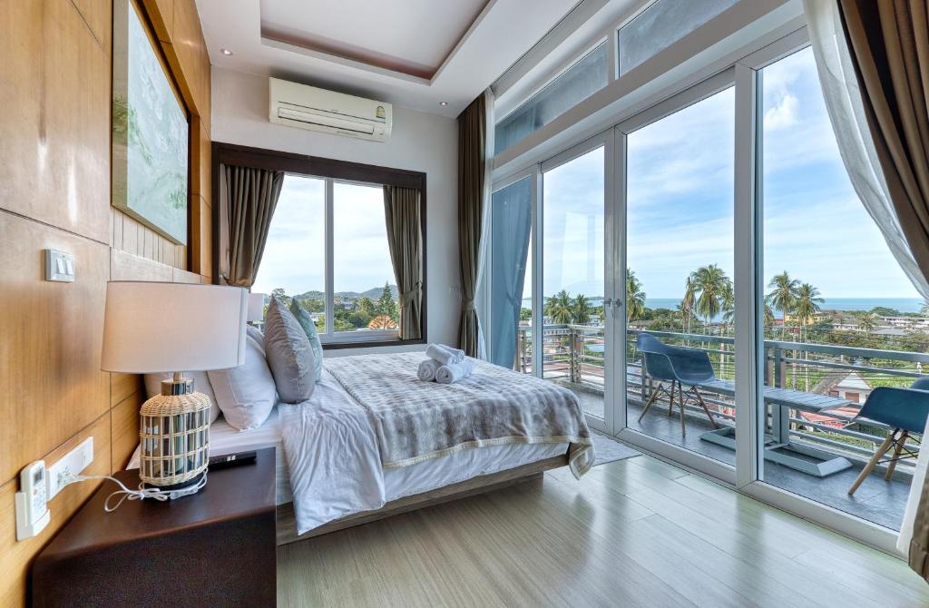 Postel nebo postele na pokoji v ubytování Surisa Seaview Pool Villas