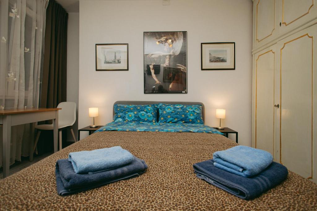 A bed or beds in a room at Casa Luba
