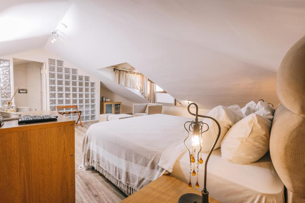 Postel nebo postele na pokoji v ubytování Jade Residence