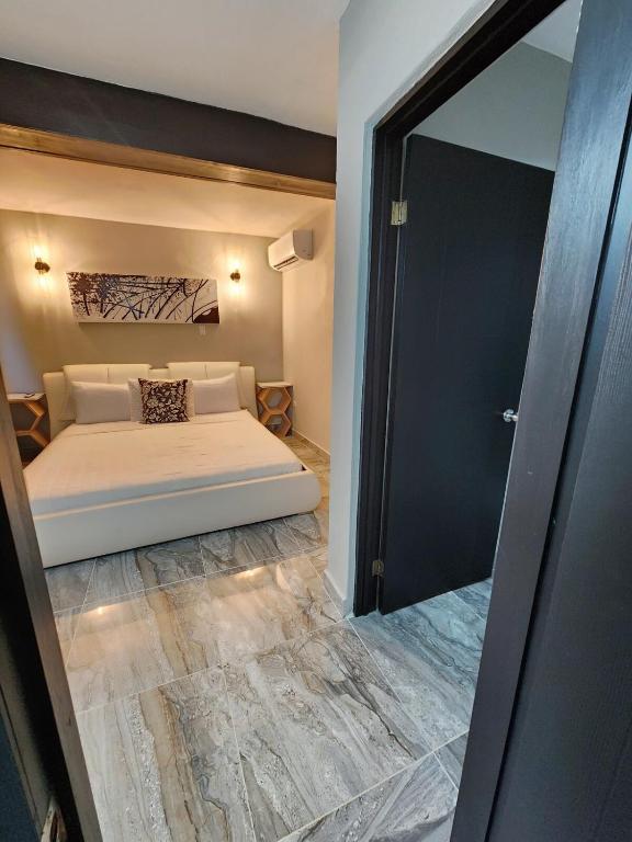 Postel nebo postele na pokoji v ubytování Casita Dulce