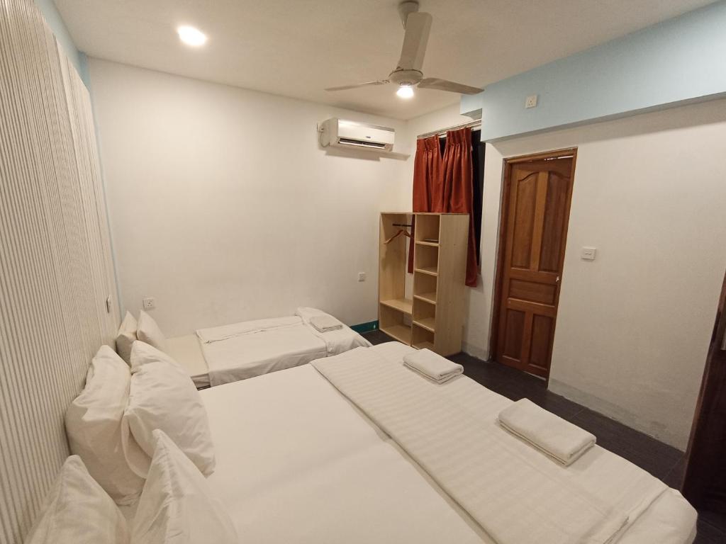 Postel nebo postele na pokoji v ubytování Elysian Hideaway