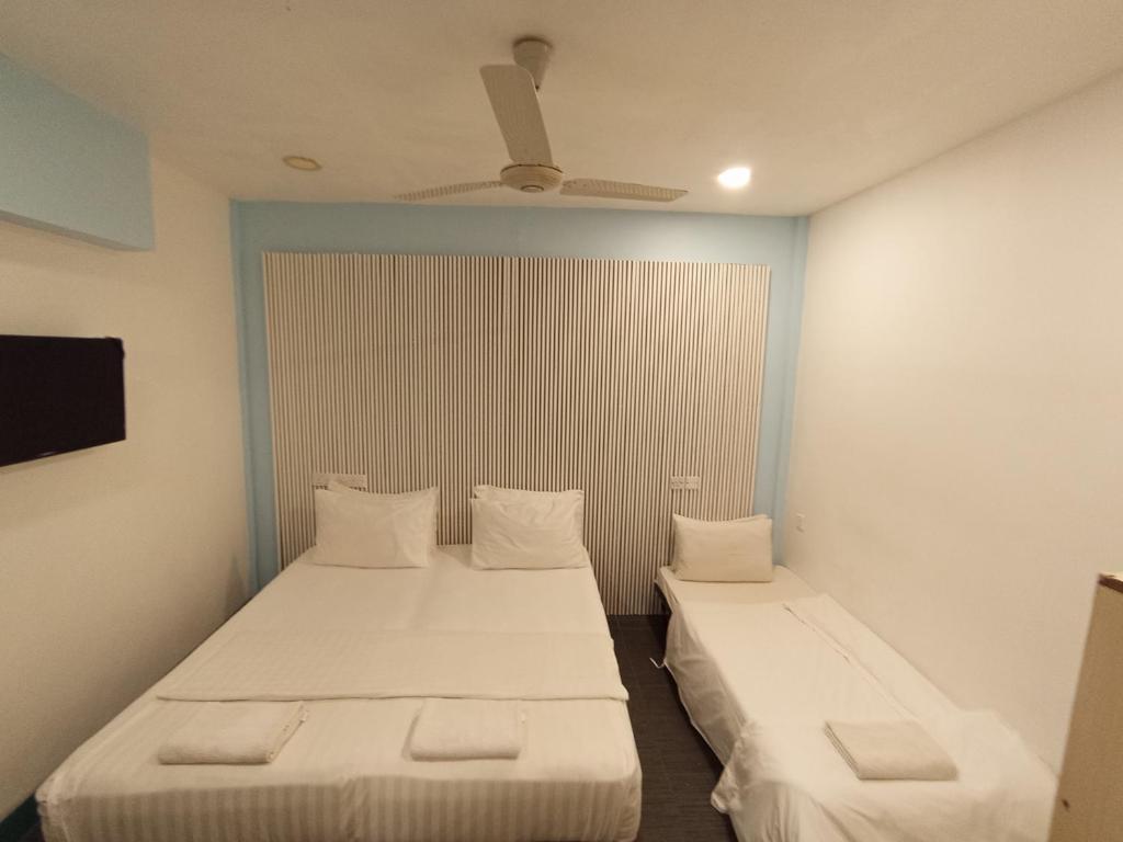 Postel nebo postele na pokoji v ubytování Elysian Hideaway