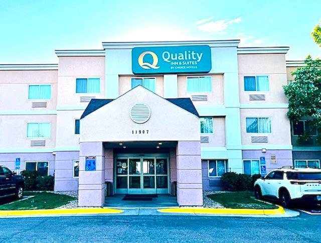 a hotel with a car parked in front of it at Quality Inn & Suites Golden - Denver West in Lakewood