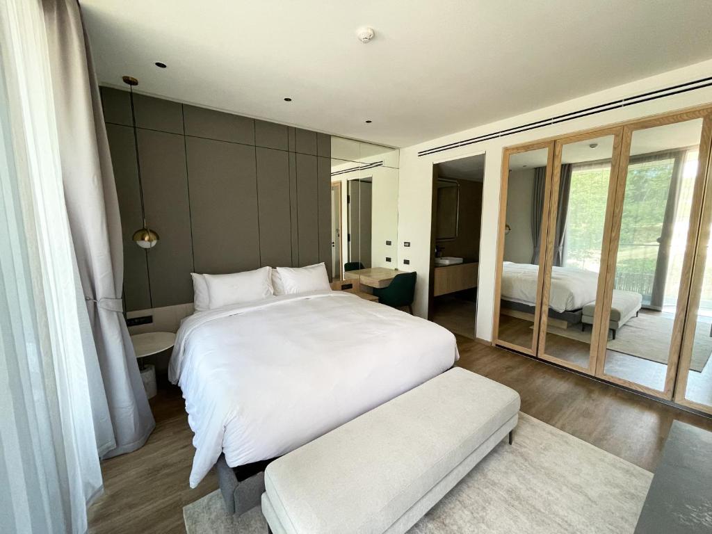 Ένα ή περισσότερα κρεβάτια σε δωμάτιο στο Layan Green Residence by ShowProperty