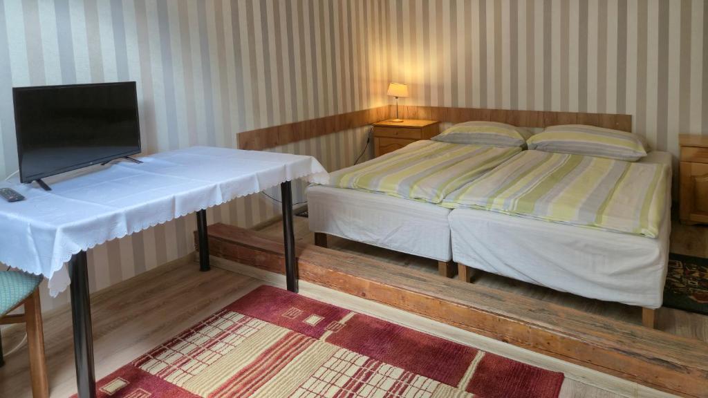 Postel nebo postele na pokoji v ubytování Dom Gościnny BIEGUN