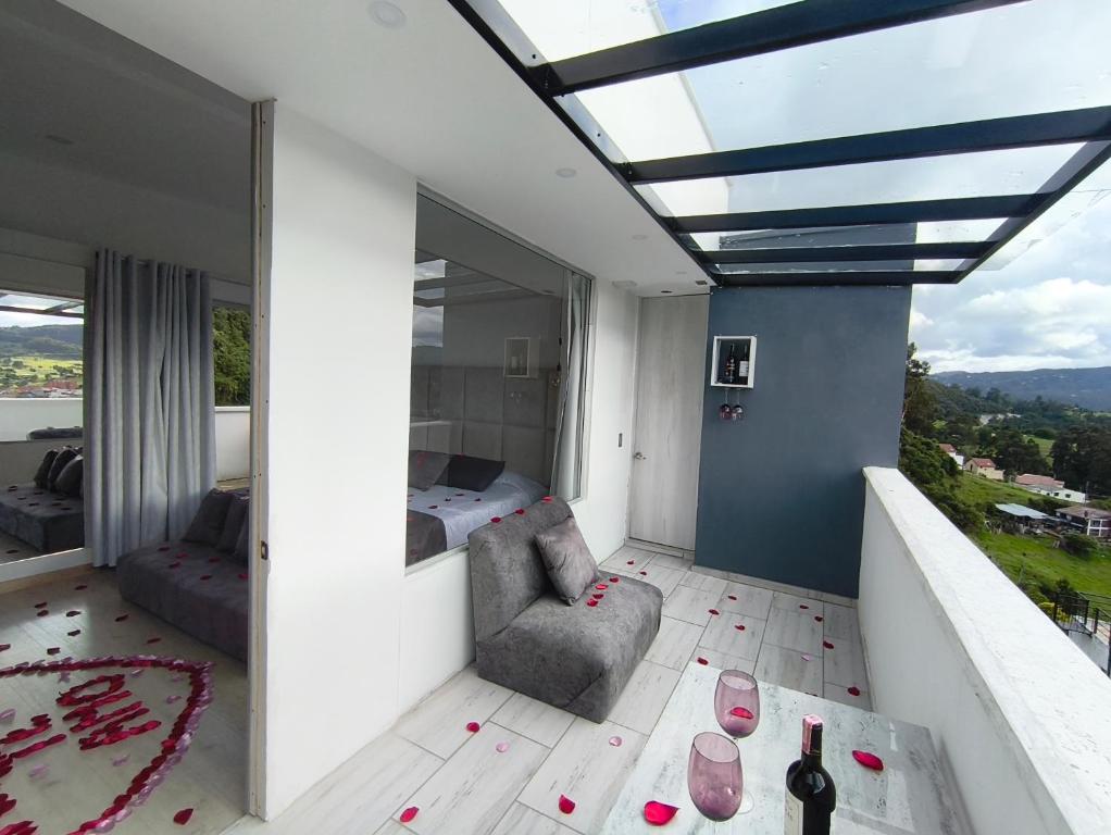 Posezení v ubytování Mirador samsara Penthouse con Jacuzzi al aire libre,piso completo