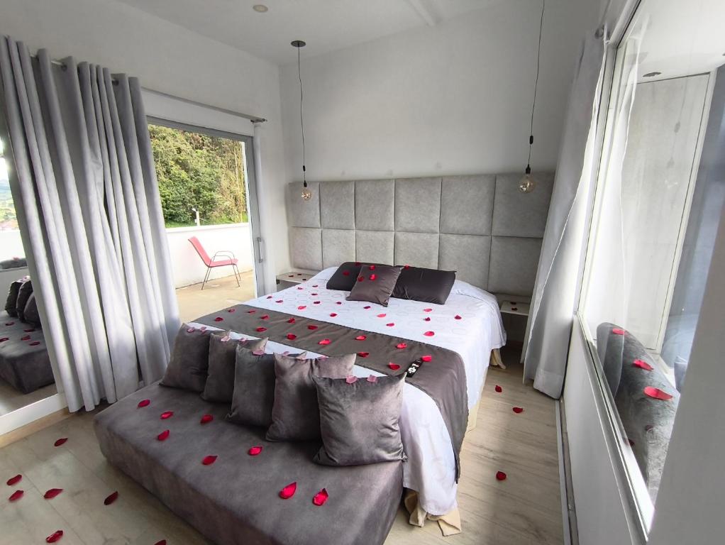 Postel nebo postele na pokoji v ubytování Mirador samsara Penthouse con Jacuzzi al aire libre,piso completo