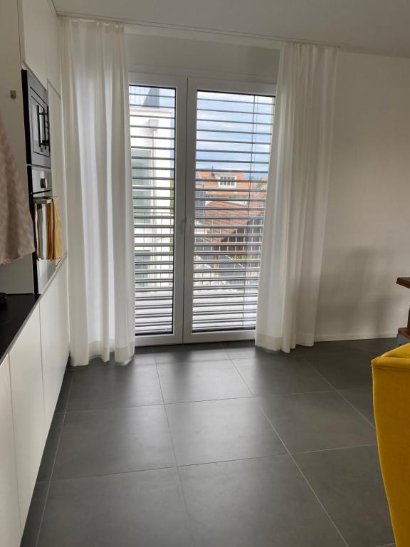 TV a/nebo společenská místnost v ubytování Upper Floor