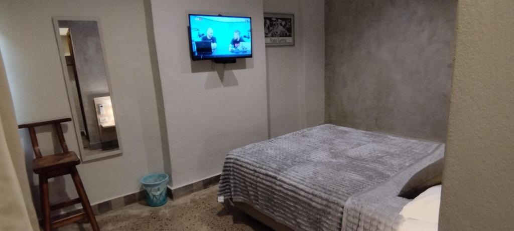 Postel nebo postele na pokoji v ubytování Taguato