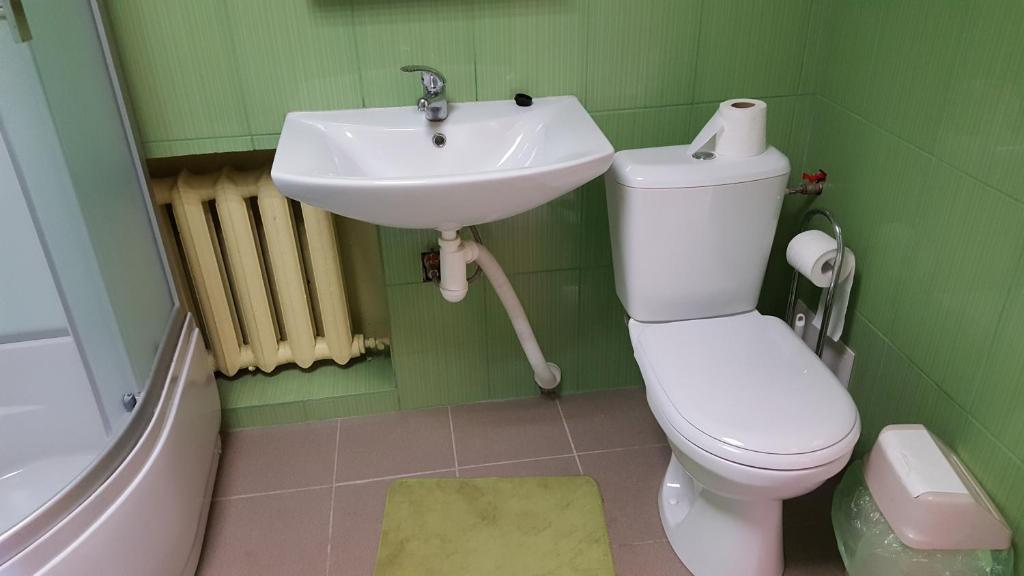 Hotel in Kraslava - 6床の混合寮の部屋のベッド