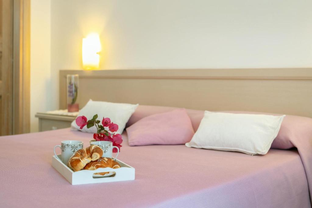 Letto o letti in una camera di La Vispa Teresa