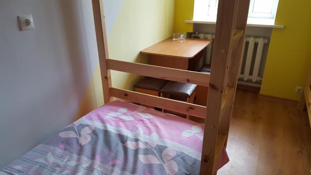 Hotel in Kraslava - 4床の混合寮の部屋のベッド