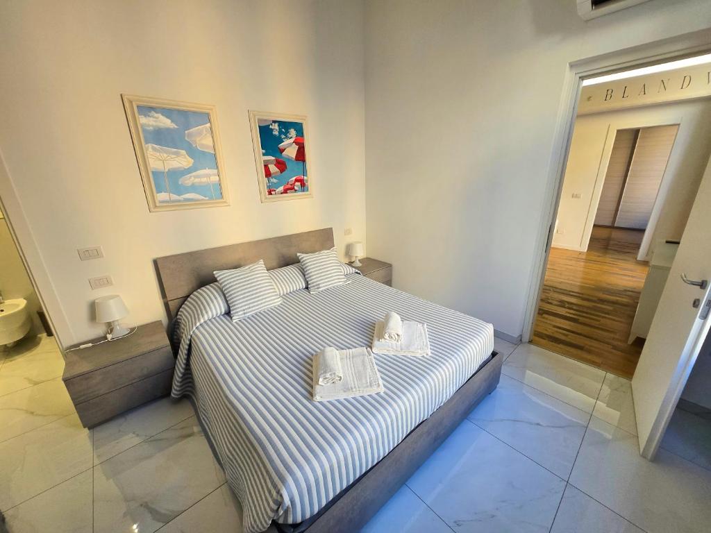 Posteľ alebo postele v izbe v ubytovaní GUVANO Luxury Apartments