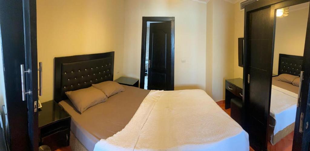 En eller flere senge i et værelse på Porto marina 3