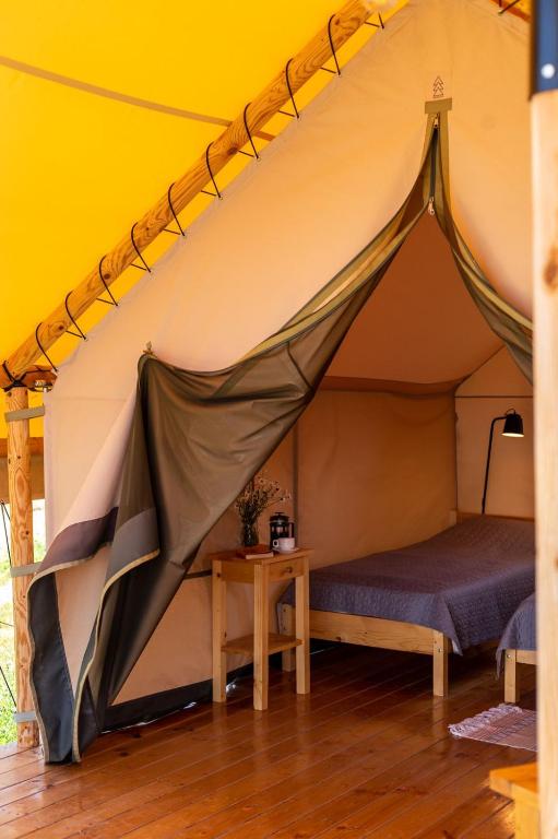Postel nebo postele na pokoji v ubytování Glamping Salty Garden