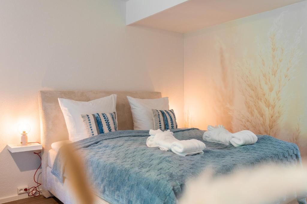 Letto o letti in una camera di Ankerherz Appartements bei Blankenese