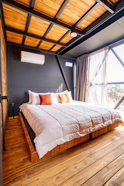 Postel nebo postele na pokoji v ubytování Hotel Coyote