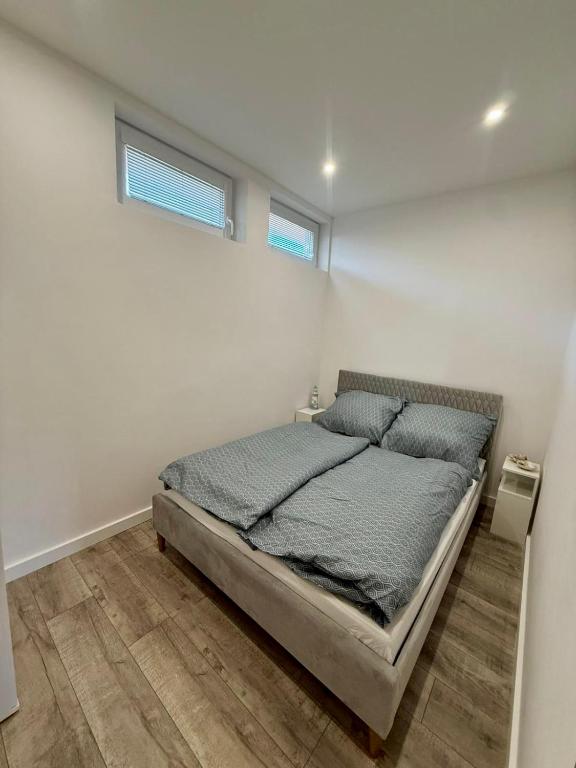 Postel nebo postele na pokoji v ubytování Apartmány Apollo