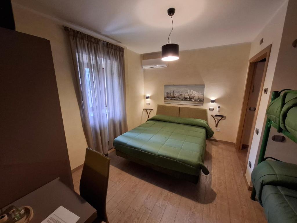 Postel nebo postele na pokoji v ubytování Antico Mulino di Cascia