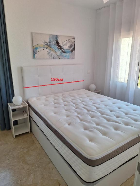 Posteľ alebo postele v izbe v ubytovaní Apartamento Playa Albir