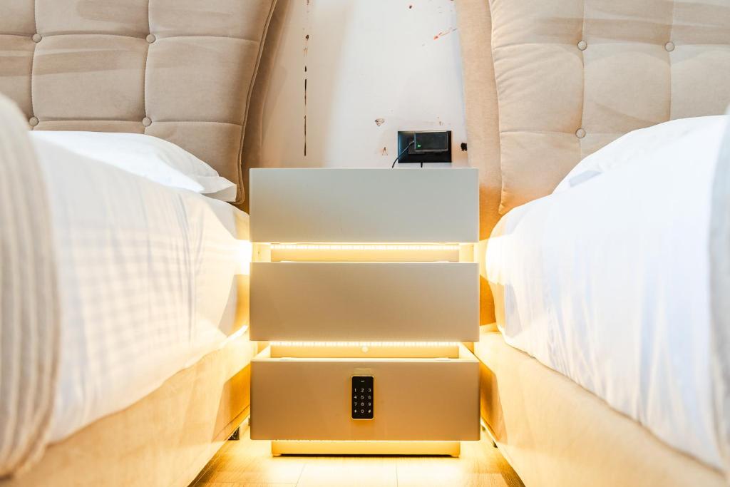 Postel nebo postele na pokoji v ubytování Premium Verona Hotel