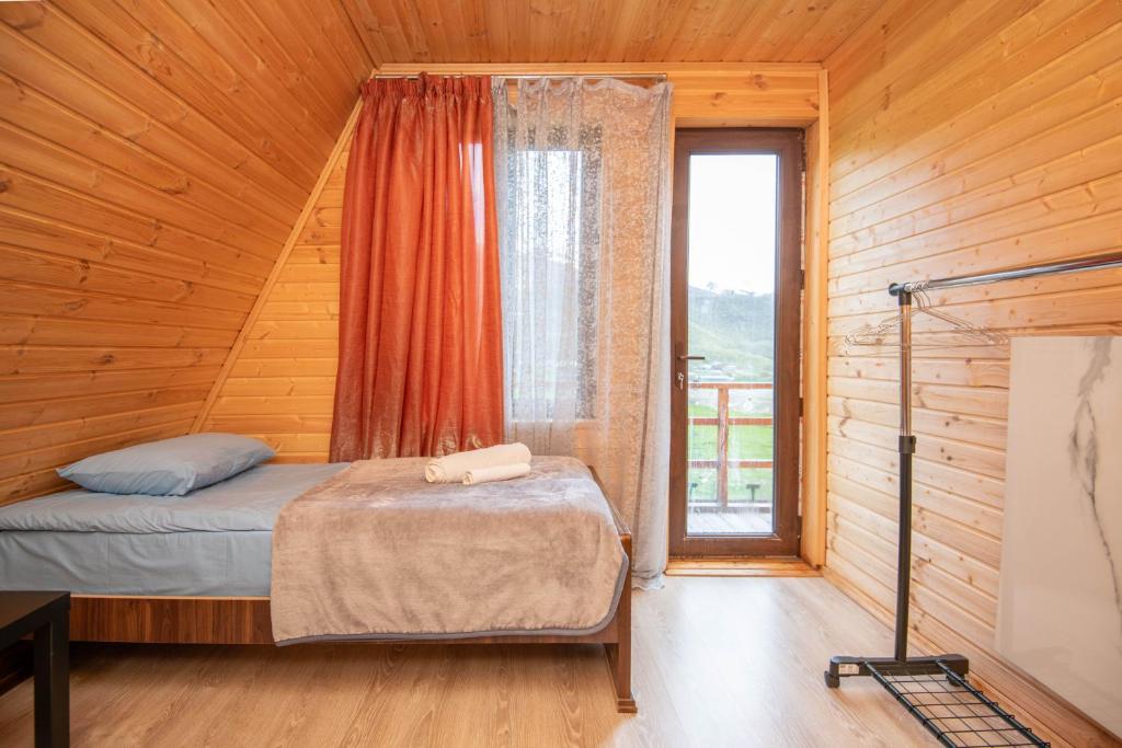 Postel nebo postele na pokoji v ubytování MOUNTAIN CABIN
