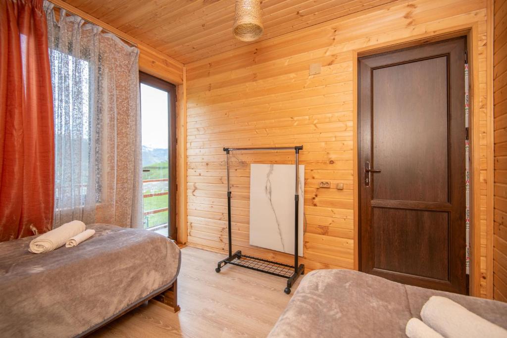 Postel nebo postele na pokoji v ubytování MOUNTAIN CABIN