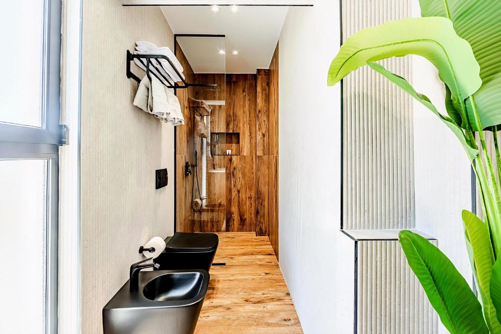TV a/nebo společenská místnost v ubytování Premium Verona Hotel