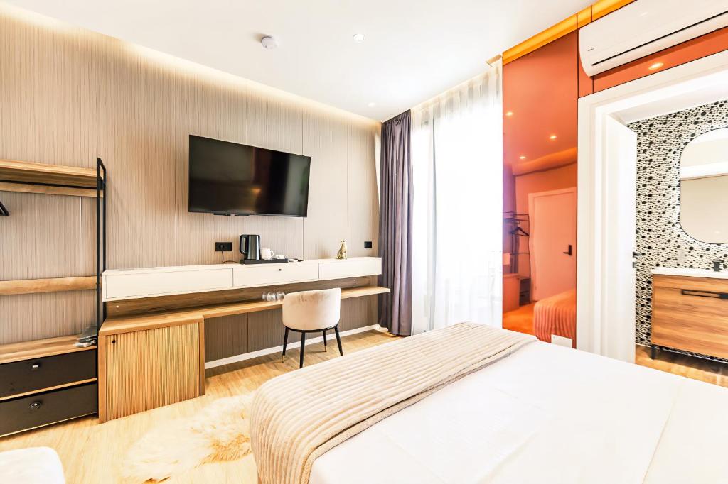 Postel nebo postele na pokoji v ubytování Premium Verona Hotel