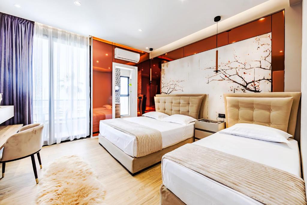Postel nebo postele na pokoji v ubytování Premium Verona Hotel