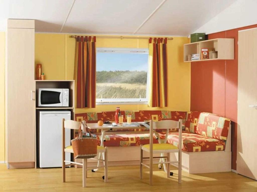 Kuchyň nebo kuchyňský kout v ubytování Chalet 4 étoiles - Piscine - efa00d