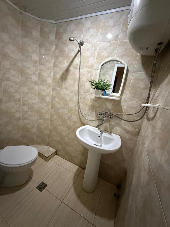 Koupelna v ubytování LUNA Hotel