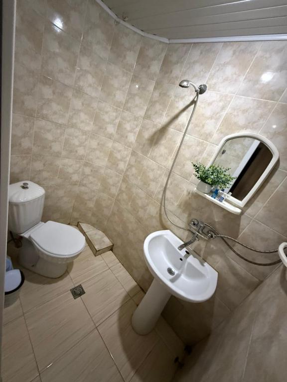 Koupelna v ubytování LUNA Hotel