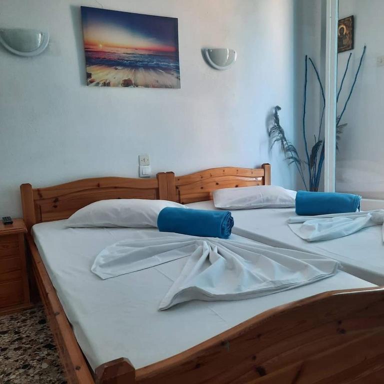 Postel nebo postele na pokoji v ubytování Mimika studios