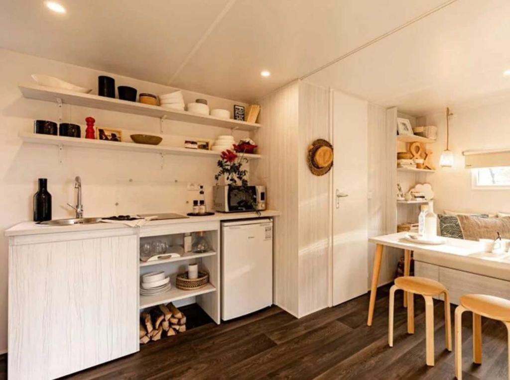 Kuchyň nebo kuchyňský kout v ubytování Chalet 4 étoiles - Piscine - efa00d