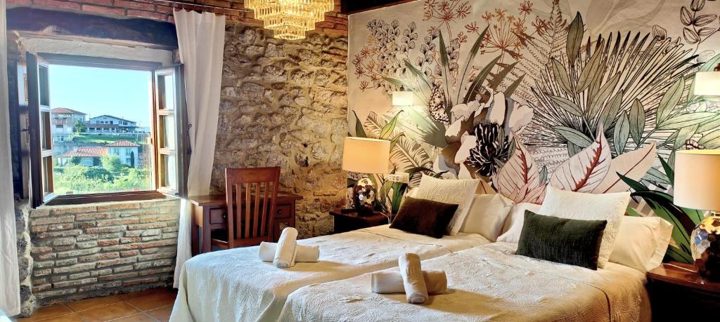 A bed or beds in a room at El Juacu