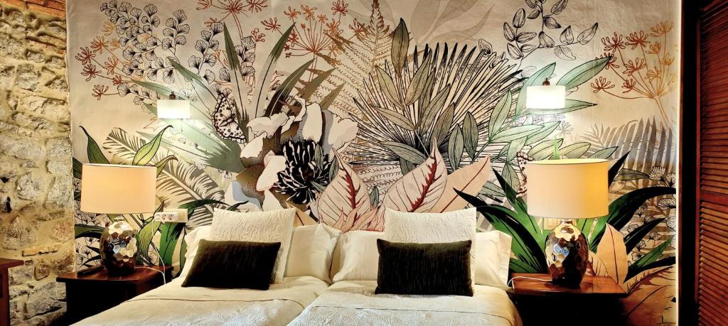 A bed or beds in a room at El Juacu