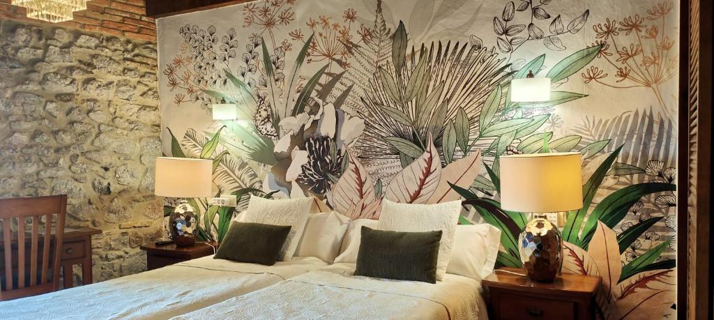 A bed or beds in a room at El Juacu