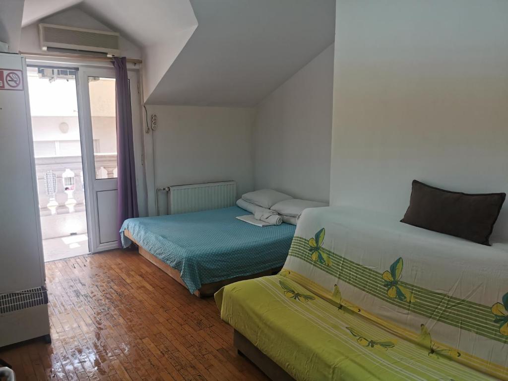 Postel nebo postele na pokoji v ubytování Stars Aspava Blue HOSTEL