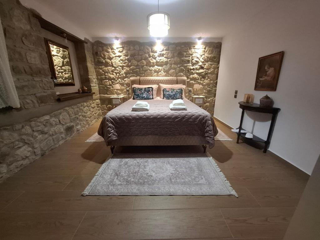 Postel nebo postele na pokoji v ubytování Elen's Suites Pramanta