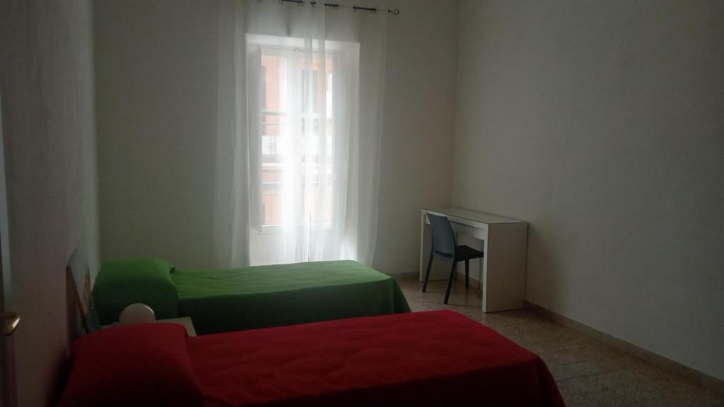 Postel nebo postele na pokoji v ubytování Penelope